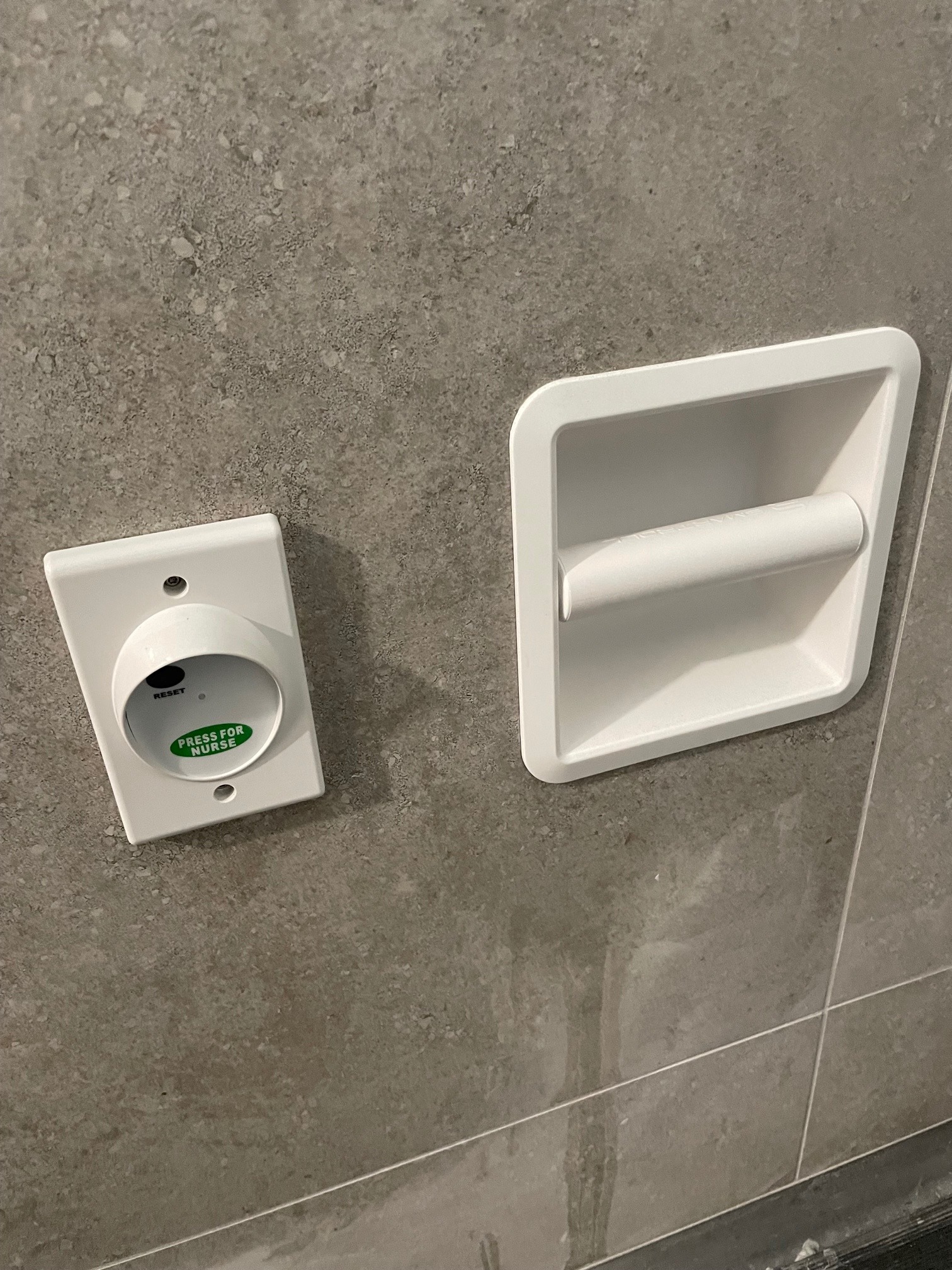 SmartRoll White installed in commercial bathroom